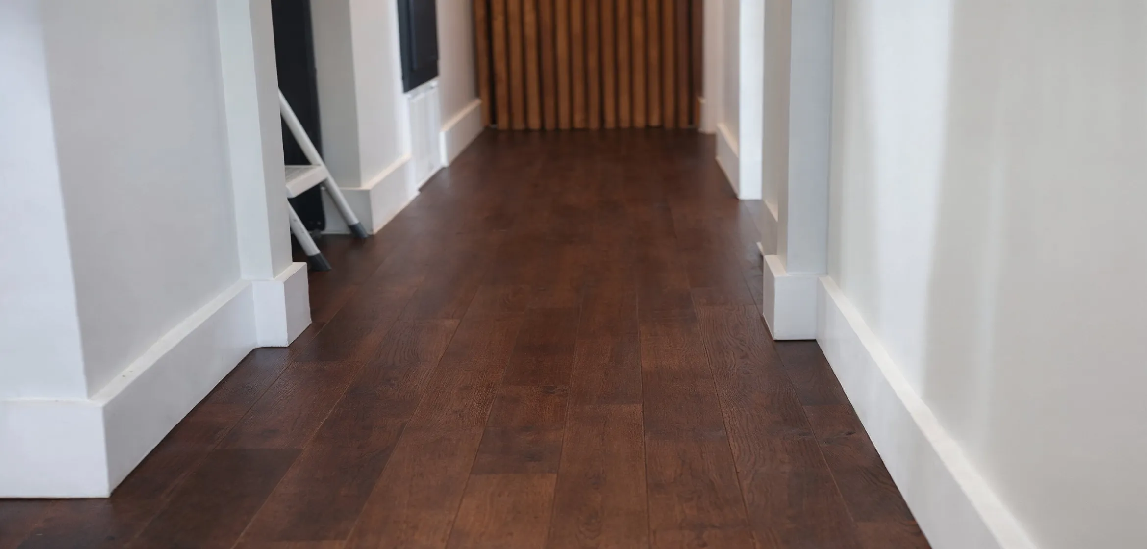 Restored hardwood flooring after professional water damage drying and repairs in Dallas